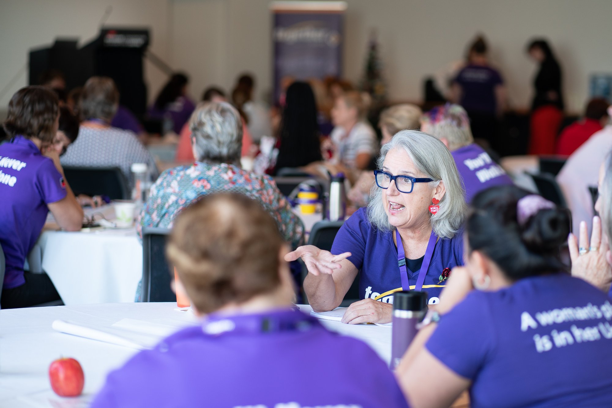 Together members debating an award.
